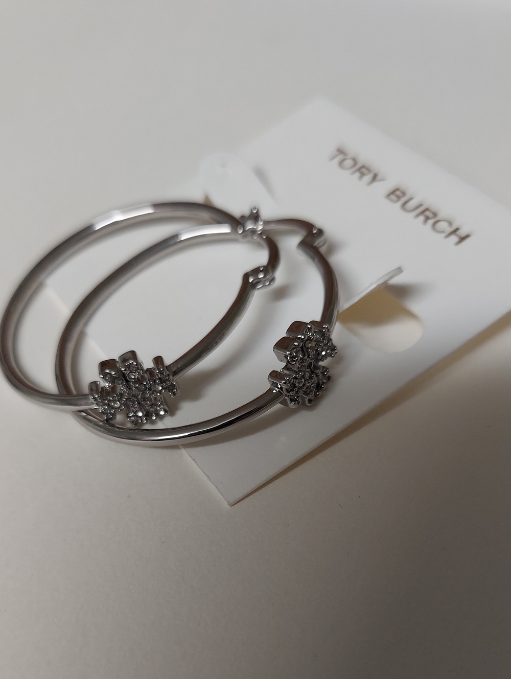 Tory Burch Polished Silver Hoop Earrings with Crystal Accents